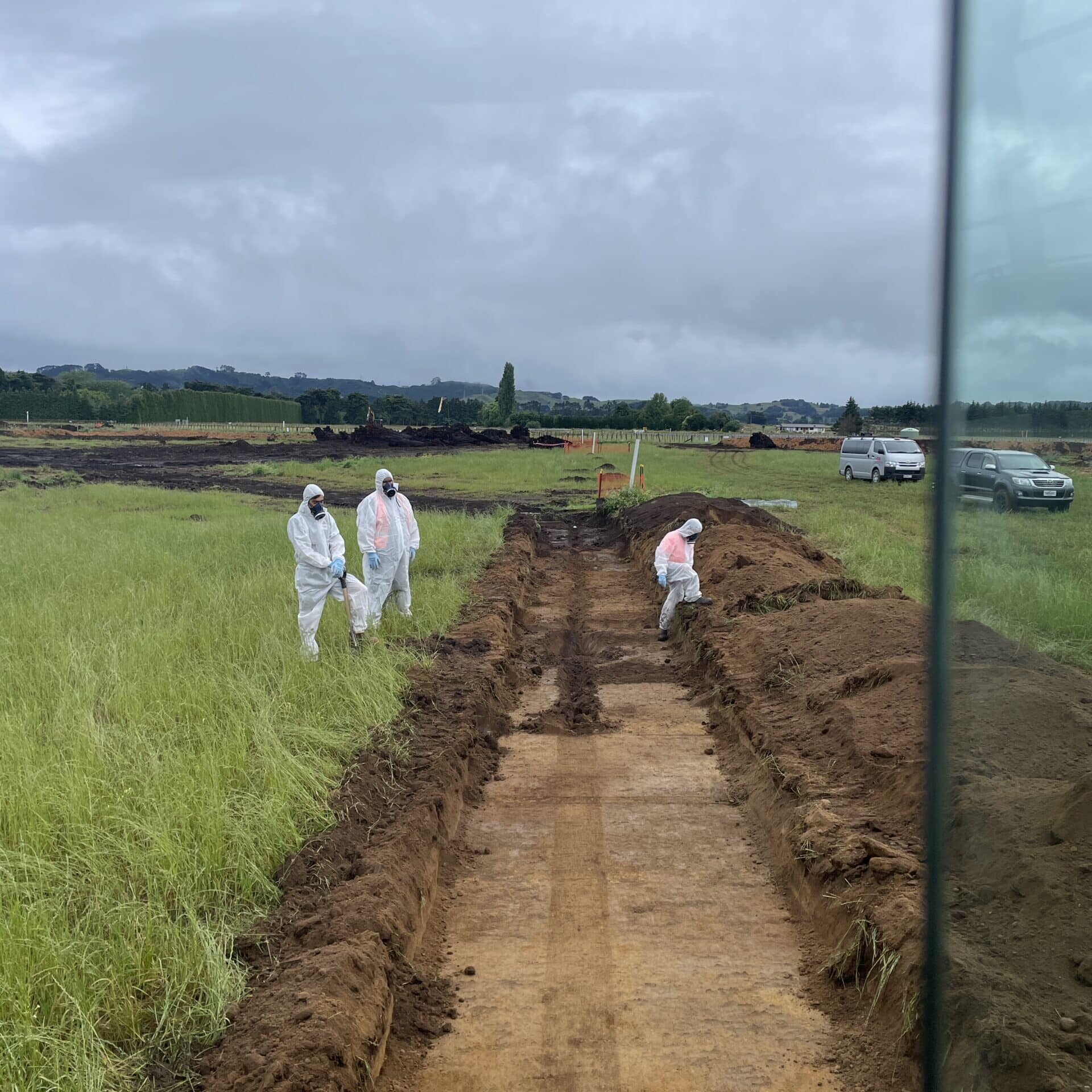 Asbestos contaminated soil remediation around old sheds.