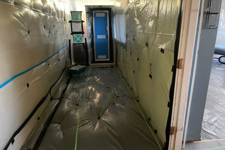 Interior view of Class A asbestos removal at a Northand school