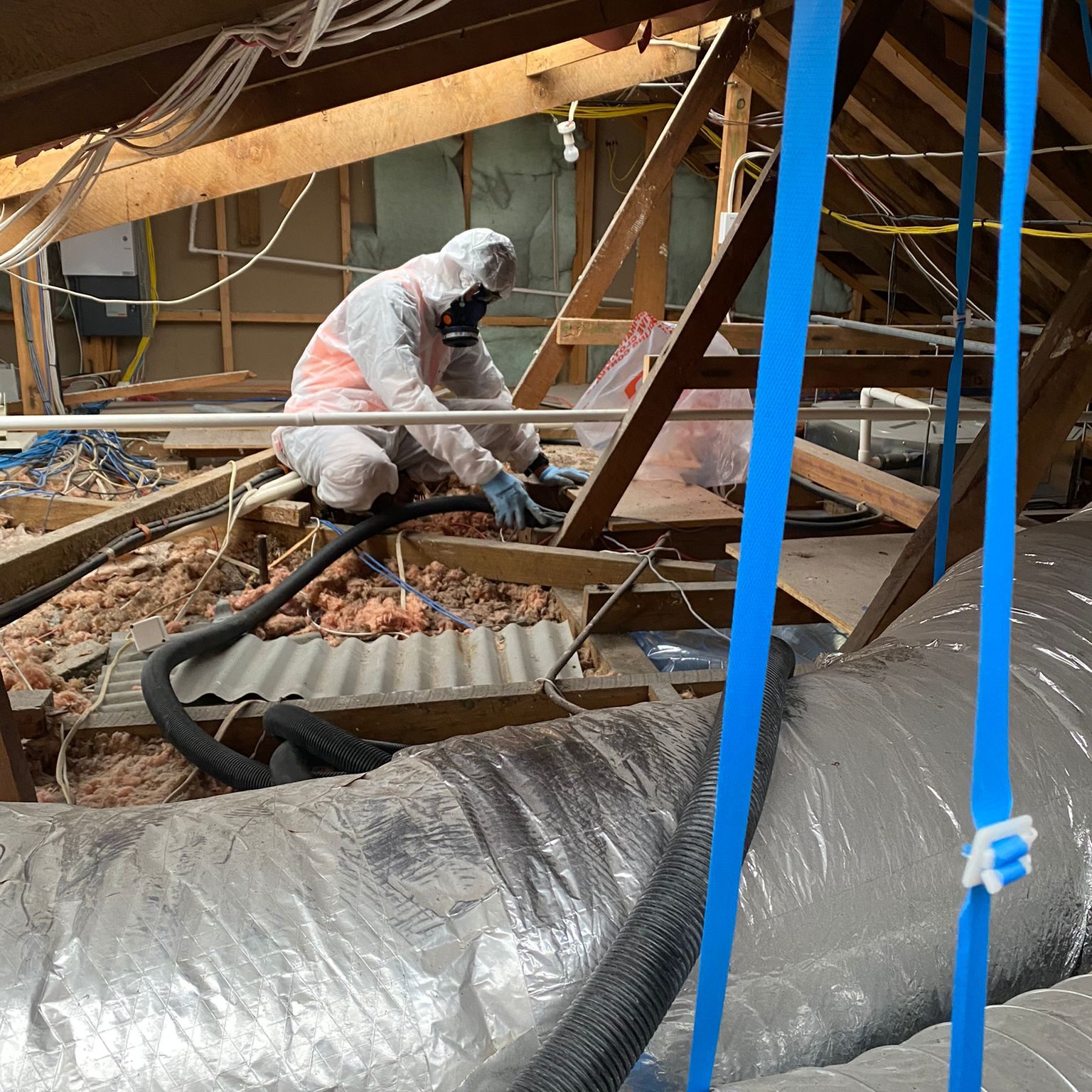 Removing asbestos from inside ceiling void