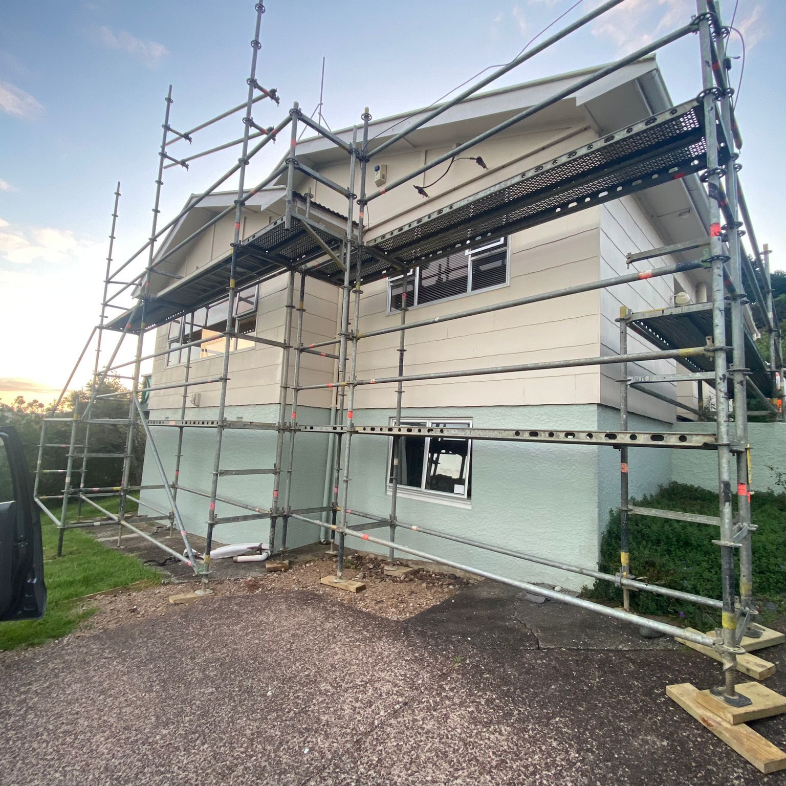 Scaffolding around a house prior to Class B Asbestos removal