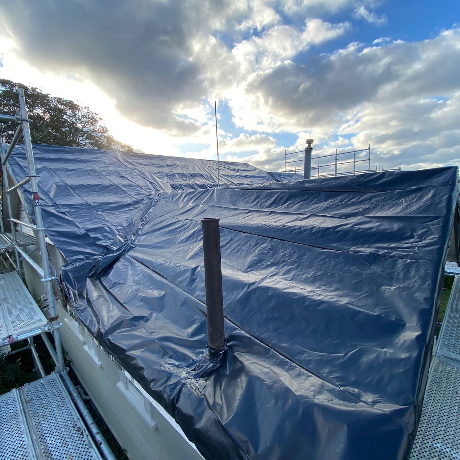 Class B Asbestos roof removal weatherproofing